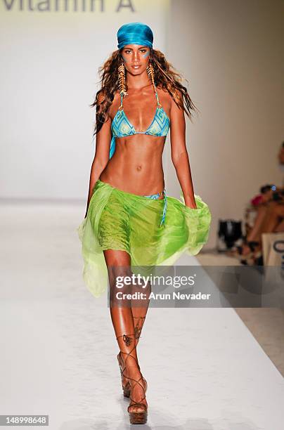 Model walks the runway during the Vitamin A By Amahlia Stevens fashion show at The Raleigh on July 20, 2012 in Miami, Florida.