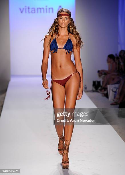 Model walks the runway during the Vitamin A By Amahlia Stevens fashion show at The Raleigh on July 20, 2012 in Miami, Florida.