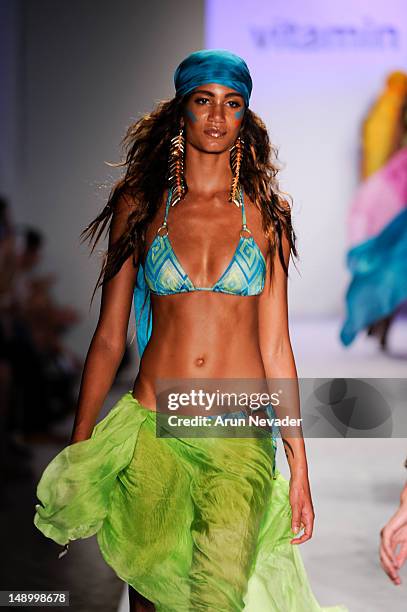 Model walks the runway during the Vitamin A By Amahlia Stevens fashion show at The Raleigh on July 20, 2012 in Miami, Florida.