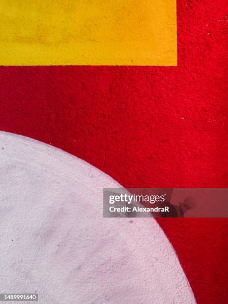 vibrant paint shapes in red, yellow and white, in an abstract composition with copy space. - alexandra rojas fotografías e imágenes de stock