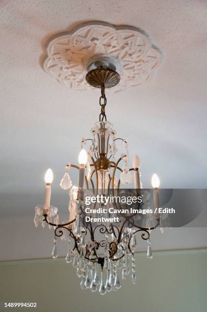 chandelier hanging to ceiling, budapest, hungary - kronleuchter stock-fotos und bilder