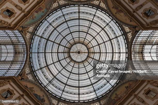 low angle view of glass ceiling, galleria vittorio emanuele ii, milan, italy - milan photos et images de collection