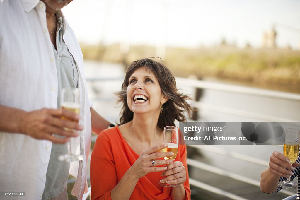 Woman smiling with a champagne glass