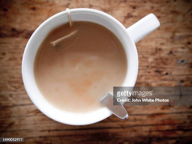 cup of tea on a wooden table. - tea bags stock pictures, royalty-free photos & images