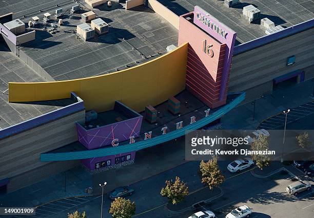 Seen from the air, police continue to investigate outside the Century 16 movie theatre where suspect James Holmes went on a shooting rampage during...