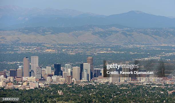 The downtown Denver skyline is seen from the air a day after a gunman went on a shooting rampage at the Century 16 movie theatre during an early...