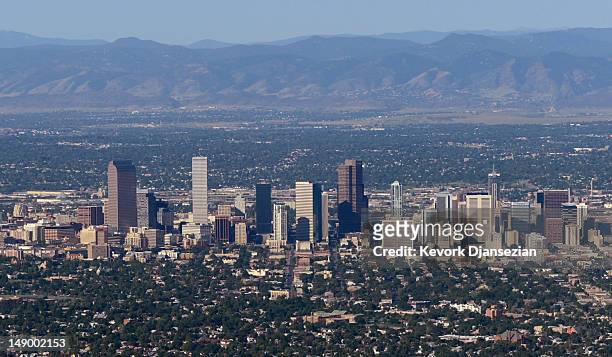 The downtown Denver skyline is seen from the air a day after a gunman went on a shooting rampage at the Century 16 movie theatre during an early...