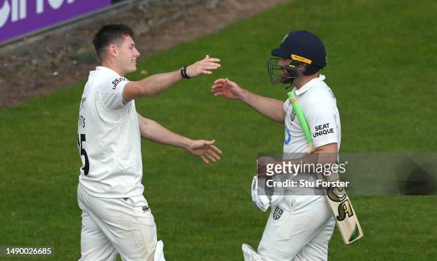 Durham batsman Ben Raine is congratulated by Matthew Potts after Durham had won the match by 1 wicket during the 4th day of the LV= Insurance County...