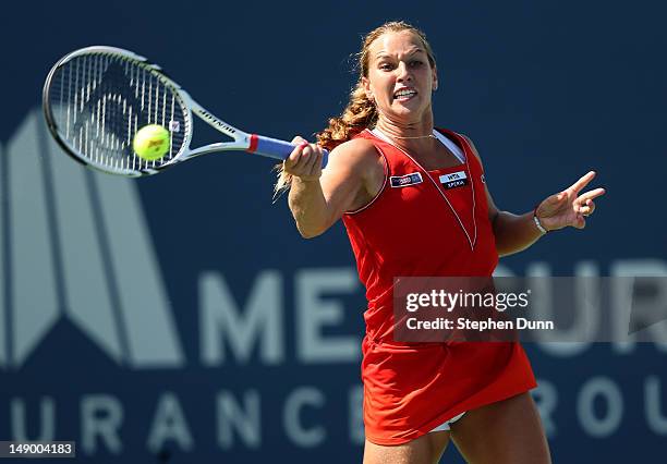 Dominka Cibulkova of Slovakia returns a shot to Nadia Petrova of Russia during day eight of the Mercury Insurance Open Presented By Tri-City Medical...