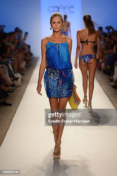 Model walks the runway at the Caffe Swimwear show during Mercedes-Benz Fashion Week Swim 2013 at The Raleigh on July 21, 2012 in Miami Beach, Florida.