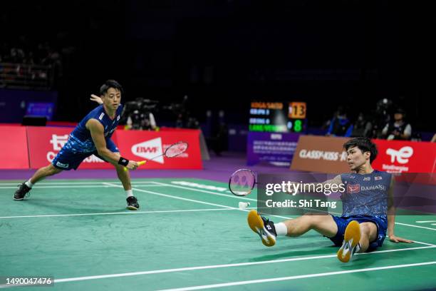 Akira Koga and Taichi Saito of Japan compete in the Men's Doubles Round Robin match against Ben Lane and Sean Vendy of England during day one of the...