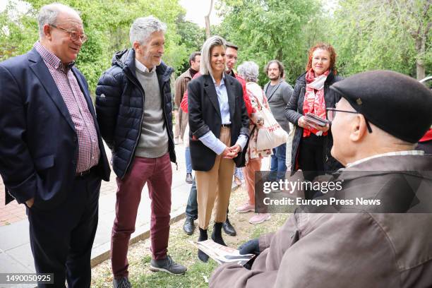 Interior Minister Fernando Grande Marlaska and Avila mayoral candidate Eva Arias arrive at a PSOE rally at the Parque Infantil de Trafico on May 14...