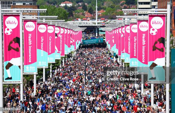 General view of fans arriving on Wembley Way prior to the Vitality Women's FA Cup Final between Chelsea FC and Manchester United at Wembley Stadium...