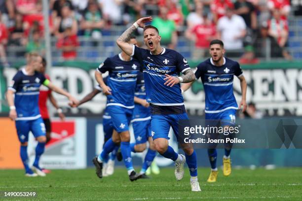 Philip Tietz of SV Darmstadt 98 celebrates after scoring the team's first goal during the Second Bundesliga match between Hannover 96 and SV...