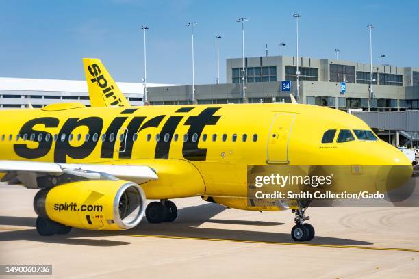 Logo for Spirit Airlines on a yellow jet airplane at Austin-Bergstrom International Airport, Austin, Texas, March 11, 2023.