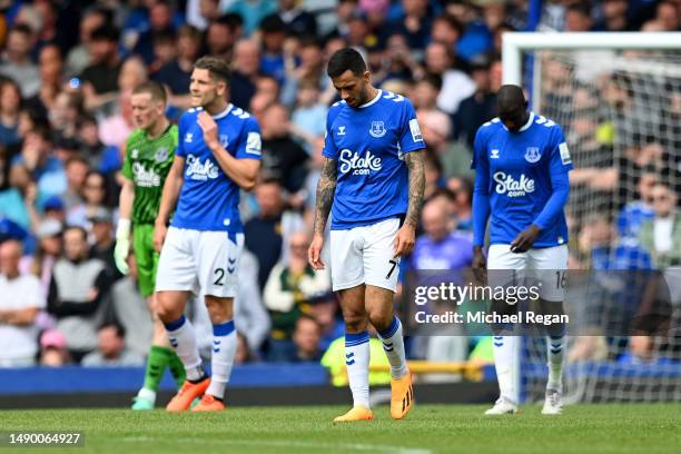 Dwight McNeil of Everton reacts after Manchester City scored their sides first goal during the Premier League match between Everton FC and Manchester...