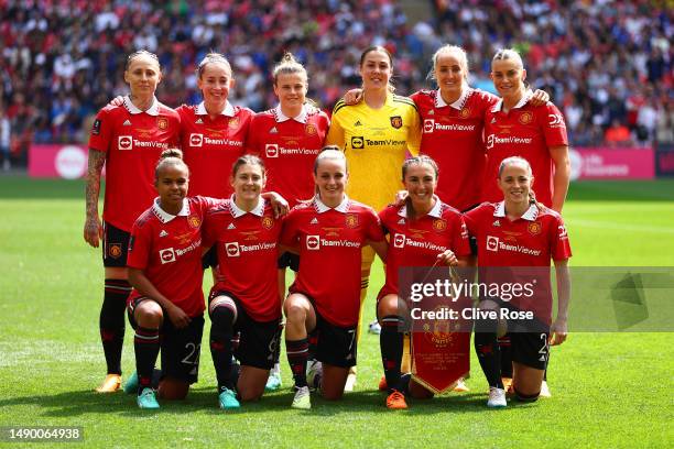 Manchester United players pose for a photo prior to the Vitality Women's FA Cup Final between Chelsea FC and Manchester United at Wembley Stadium on...