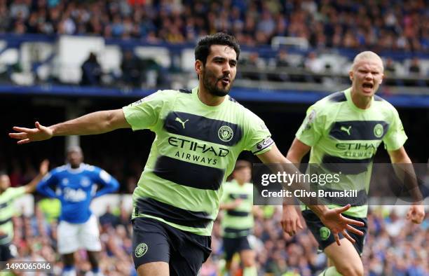 Ilkay Guendogan of Manchester City celebrates after scoring the team's first goal during the Premier League match between Everton FC and Manchester...