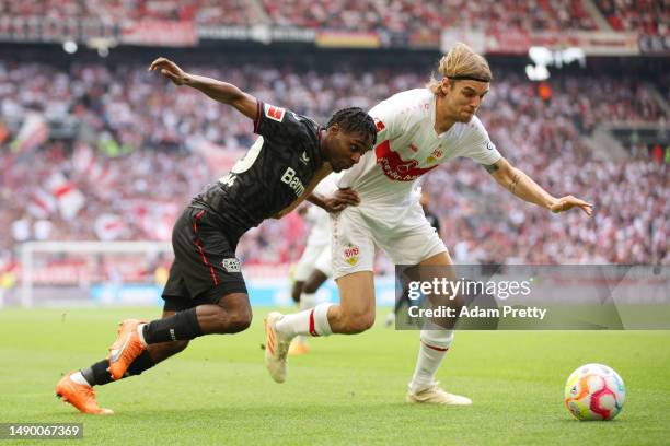 Jeremie Frimpong of Bayer 04 Leverkusen and Borna Sosa of VfB Stuttgart battle for possession during the Bundesliga match between VfB Stuttgart and...