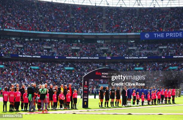 Players of Chelsea and Manchester United line up on the pitch prior to the Vitality Women's FA Cup Final between Chelsea FC and Manchester United at...