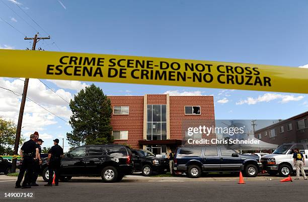Police surround the apartment of James Holmes, the suspect in the Colorado theater shooting, on July 21, 2012 in Aurora, Colorado. Numerous explosive...