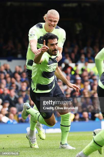 Ilkay Guendogan of Manchester City celebrates after scoring the team's first goal during the Premier League match between Everton FC and Manchester...