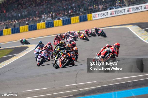 Marc Marquez of Spain and Repsol Honda Team leads after the race start during the Race of the MotoGP SHARK Grand Prix de France at Bugatti Circuit on...