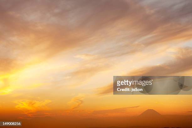 sunset with mt. fugi in the distant - sunset stock-fotos und bilder