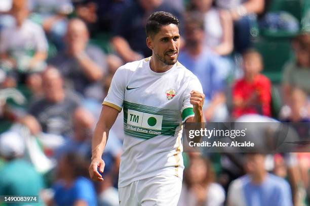 Fidel of Elche CF celebrates after scoring the team's first goal during the LaLiga Santander match between Elche CF and Atletico de Madrid at Estadio...