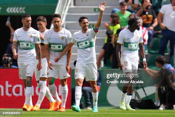 Fidel of Elche CF celebrates after scoring the team's first goal during the LaLiga Santander match between Elche CF and Atletico de Madrid at Estadio...