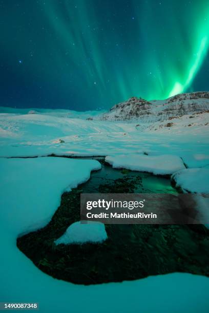 northern lights in iceland : kirkjufell, snaefellsnes - icefall stock pictures, royalty-free photos & images