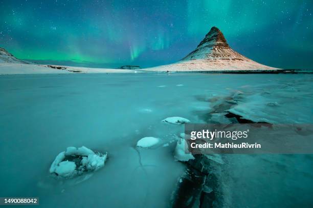 northern lights in iceland : kirkjufell, snaefellsnes - icefall stock pictures, royalty-free photos & images