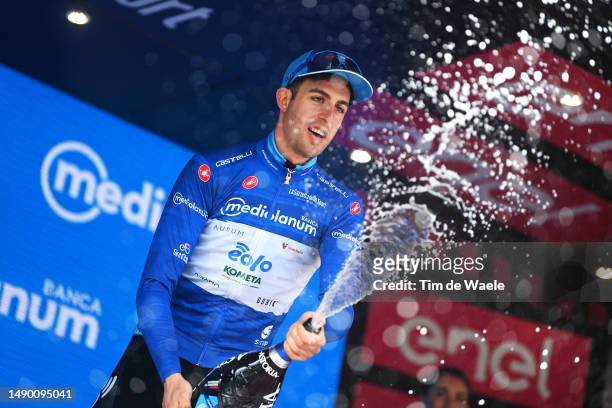 Davide Bais of Italy and Team EOLO-Kometa celebrates at podium as Blue Mountain Jersey winner during the 106th Giro d'Italia 2023, Stage 9 a 35km...