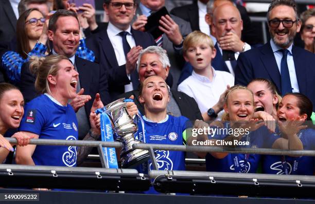 Millie Bright and Magdalena Eriksson of Chelsea lift the Vitality Women's FA Cup trophy after the team's victory during the Vitality Women's FA Cup...