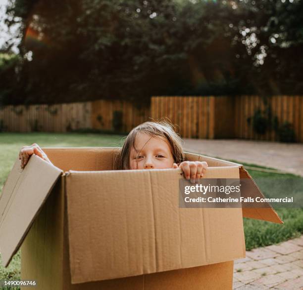 Hiding In Box 810 Child Hiding In Box Stock Photos, High-Res Pictures, and Images ...