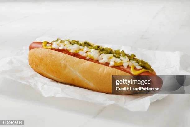 the foot long ballpark hot dog - large cucumber stockfoto's en -beelden