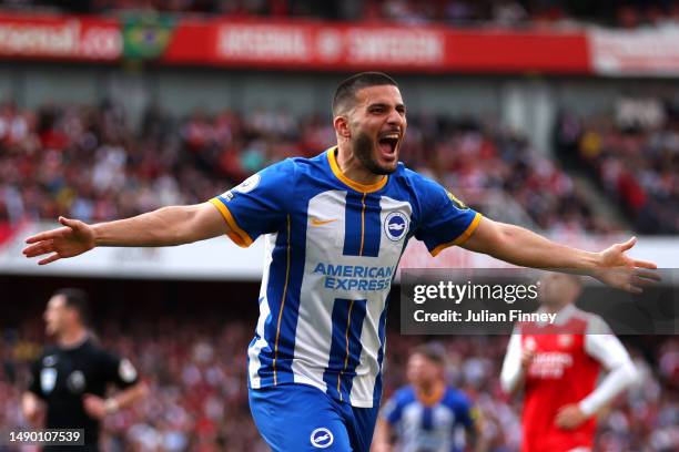 Deniz Undav of Brighton & Hove Albion celebrates after scoring the team's second goal during the Premier League match between Arsenal FC and Brighton...