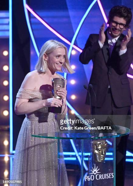 Anne-Marie Duff accepts the Supporting Actress Award for her performance in 'Bad Sisters' from Ben Whishaw at the 2023 BAFTA Television Awards with...