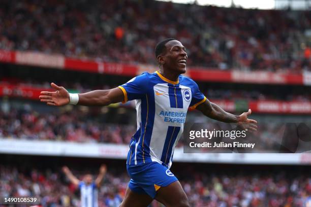 Pervis Estupinan of Brighton & Hove Albion celebrates after scoring the team's third goal during the Premier League match between Arsenal FC and...
