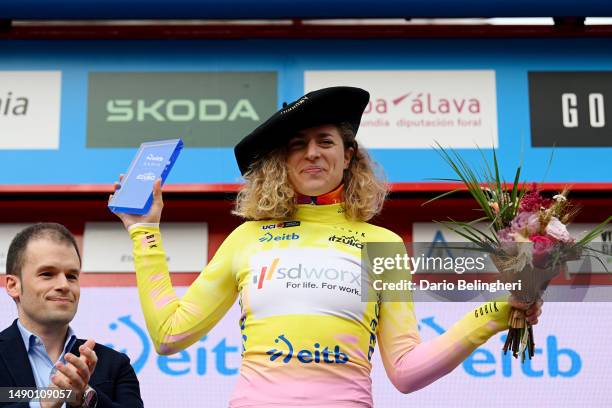 Marlen Reusser of Switzerland and Team SD Worx celebrates at podium with the Txapela Trophy as Yellow Leader Jersey winner during the 2nd Itzulia...