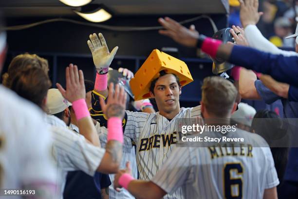 Christian Yelich of the Milwaukee Brewers celebrates a home run against the Kansas City Royals during the first inning at American Family Field on...