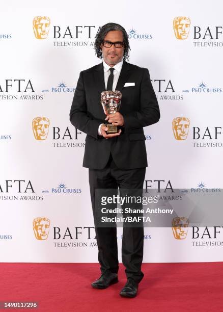David Olusoga poses in the Winner's Room with the Special Award during the 2023 BAFTA Television Awards with P&O Cruises at The Royal Festival Hall...