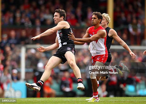 Stephen Milne of St Kilda kicks a goal during the round 17 AFL match between the Sydney Swans and the St Kilda Saints at the Sydney Cricket Ground on...
