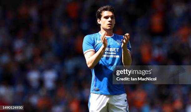 Ianis Hagi of Rangers FC acknowledges the fans after the team's victory during the Cinch Premiership match between Rangers and Celtic at Ibrox...