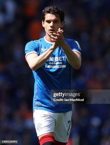 Ianis Hagi of Rangers FC acknowledges the fans after the team's victory during the Cinch Premiership match between Rangers and Celtic at Ibrox...