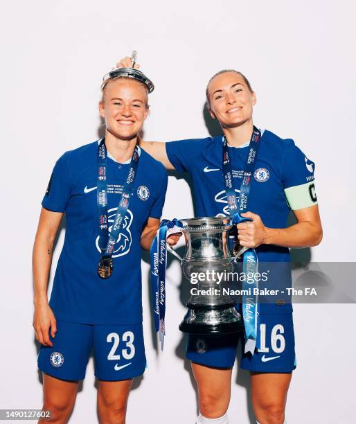 Pernille Harder and Magdalena Eriksson of Chelsea pose with the trophy following their sides victory during the Vitality Women's FA Cup Final match...