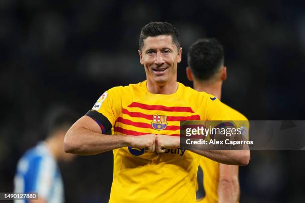 Robert Lewandowski of FC Barcelona celebrates after scoring the team's third goal during the LaLiga Santander match between RCD Espanyol and FC...