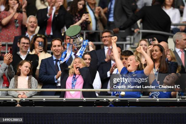 Emma Hayes, Manager of Chelsea celebrates with the Vitality Women's FA Cup trophy following her victory in the Vitality Women's FA Cup Final between...