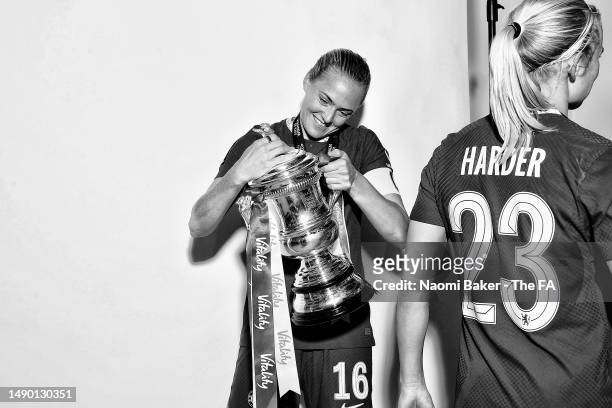 Pernille Harder and Magdalena Eriksson of Chelsea pose with the trophy following their sides victory during the Vitality Women's FA Cup Final match...