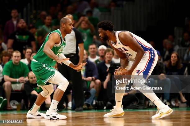 Joel Embiid of the Philadelphia 76ers controls the ball against Al Horford of the Boston Celtics during the first quarter in game seven of the 2023...